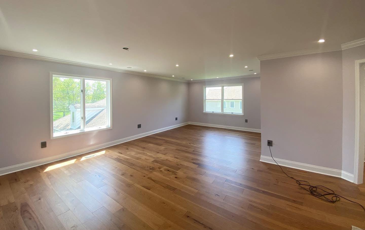 Living room with TV wall, fireplace and floating shelves